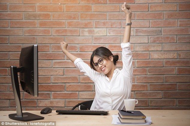 Professional reviewing movement habits and weekly goals at an office desk